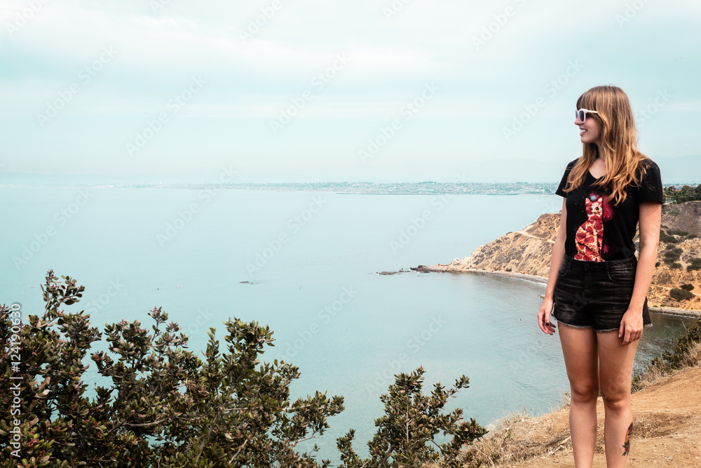 Girl and Oceanview from California Coast, United States