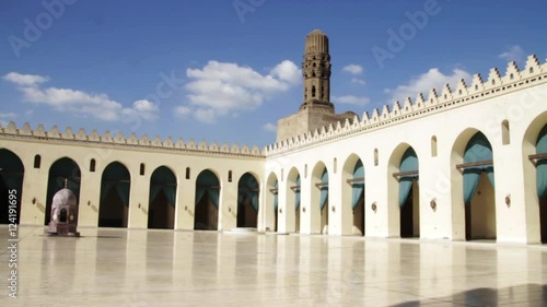 Birds fly in the courtyard of the Al-Azhar Mosque in Cairo, Egypt. photo