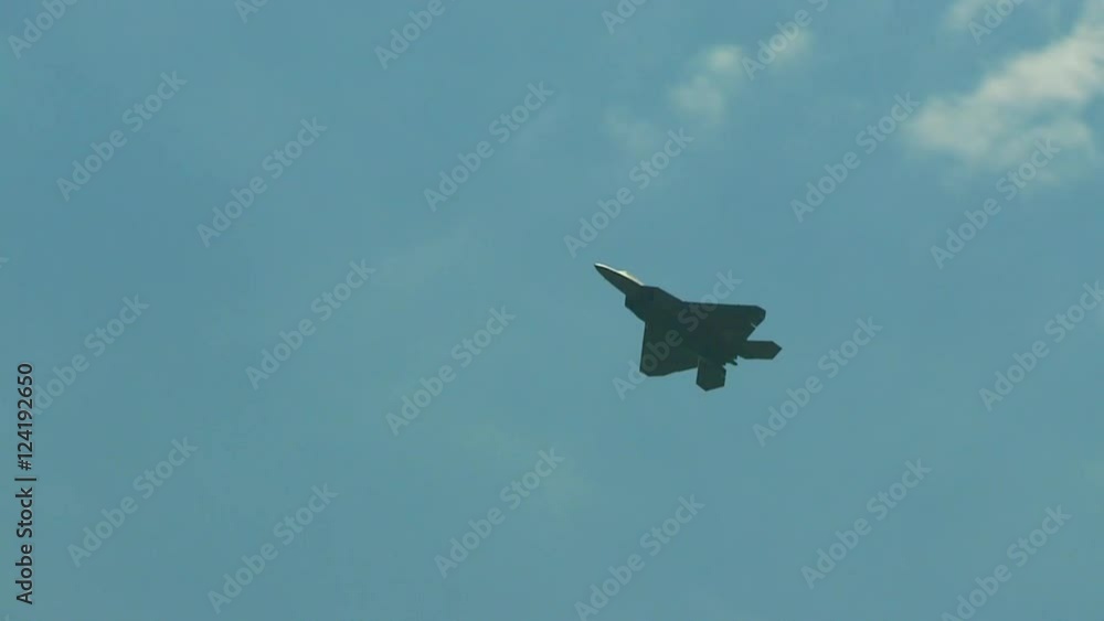 Tracking shot of fighter jet flying in the sky Tracking shot of fighter jet flying in the sky