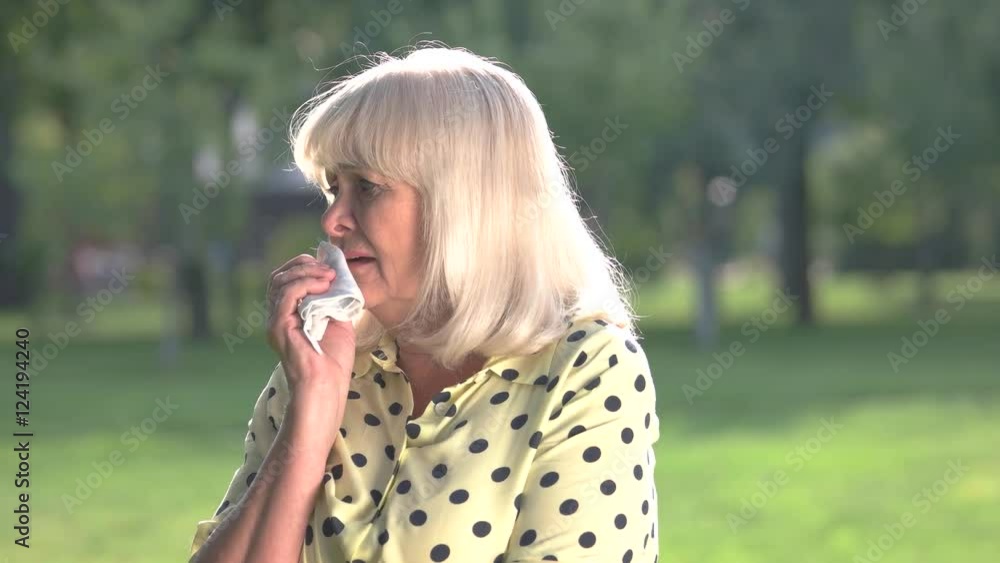 Elderly woman crying. Older lady outdoors. My heart is broken. Fate is cruel. Elderly woman crying. Older lady outdoors. My heart is broken. Fate is cruel.