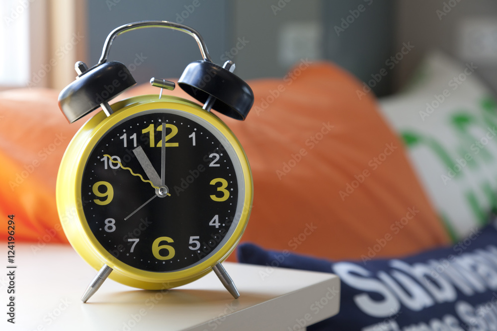 Alarm clock in a room stock photo adobe stock