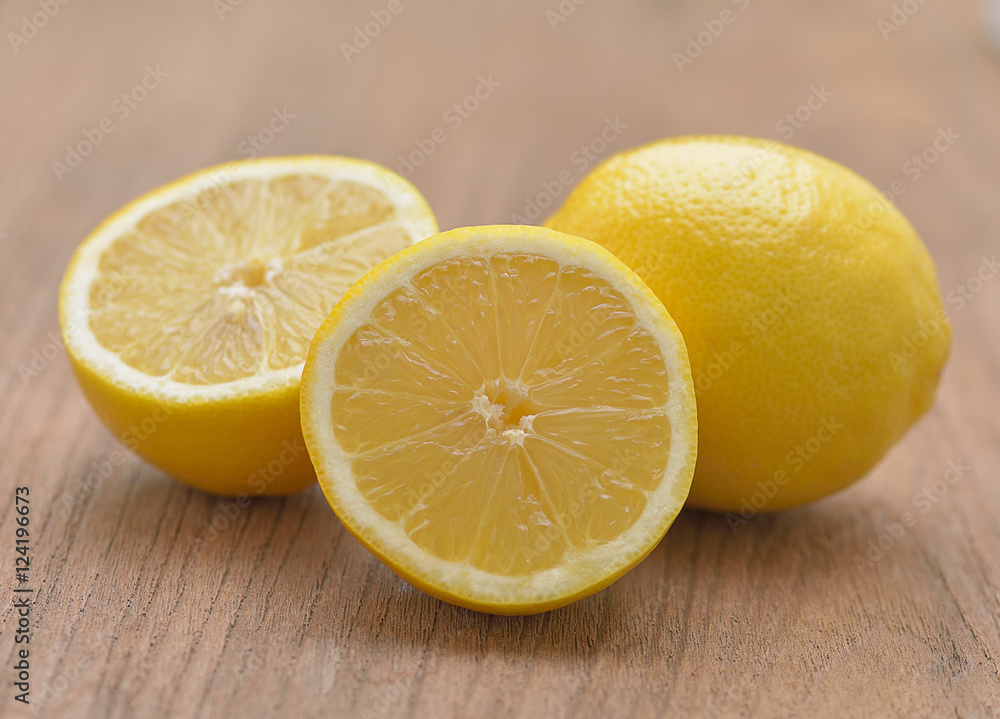 Fresh limes isolated on wooden background Fresh limes isolated on wooden background