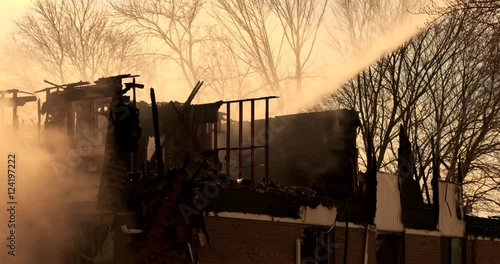 View of smoldering house fire