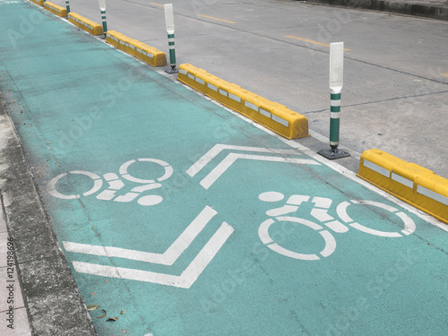 Oblique green bike lane beside the road in Bangkok, Thailand. He