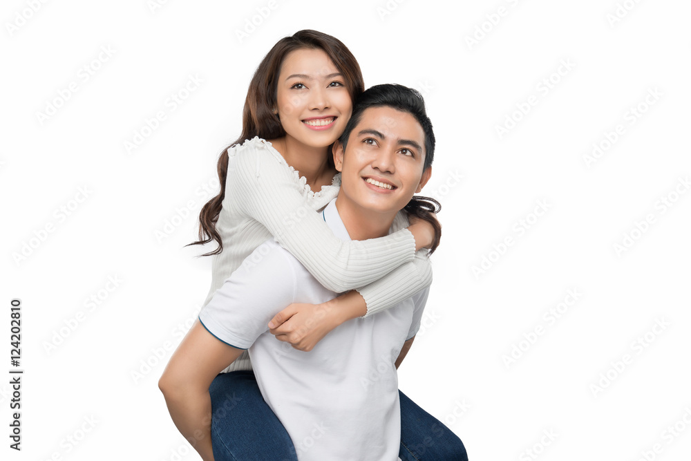Happy asian couple isolated on white background. Cheerful young Happy asian couple isolated on white background. Cheerful young