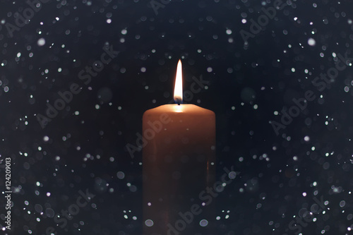 candle light isolated black with snow