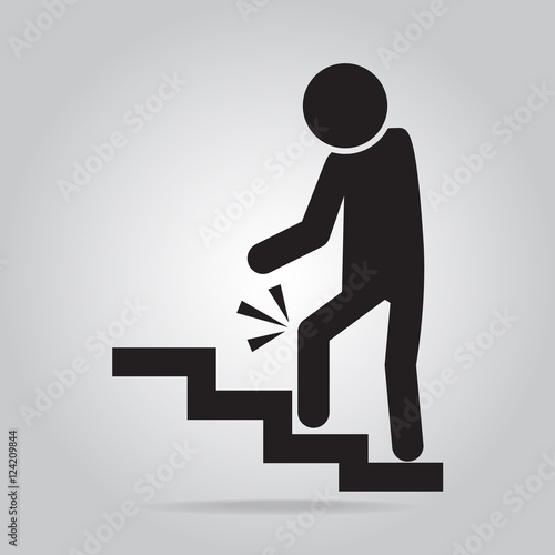Man walking on stairs and injury of the knee . person injury symbol