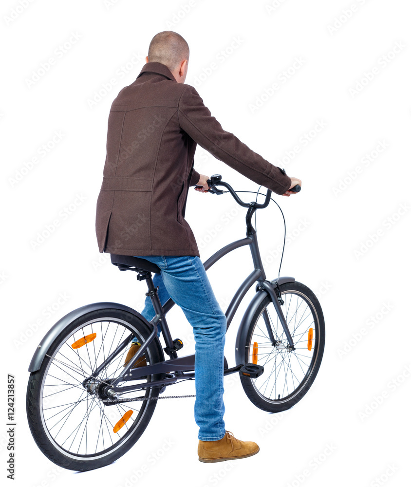 back view of a man with a bicycle. cyclist sits on the bike. Rear view people collection. backside view of person. Isolated over white background. back view of a man with a bicycle. cyclist sits on the bike. Rear view people collection. backside view of person. Isolated over white background.