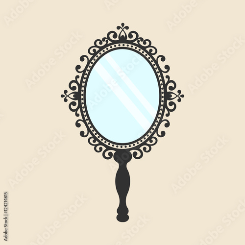 vintage mirror with a handle on the background