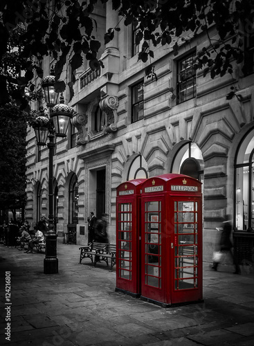 Two English telephone boxes in London