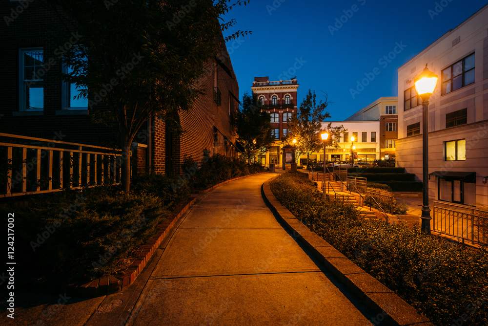 Walkway and buildings at night in downtown Rock Hill, South Caro