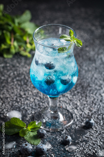 Blueberry cocktail with ice and mint