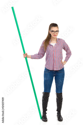 Woman Posing With Green Stick