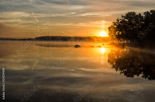 Sunrise over Swedish summer lake © Piotr Wawrzyniuk