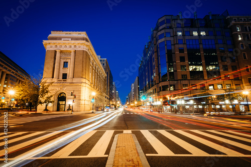 Buildings and traffic along H Street at night, in Washington, DC © jonbilous