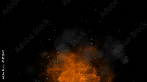 Flames, cloud sparks and smoke.   Raging flames, quickly spreading a cloud of smoke with sparks from fire.