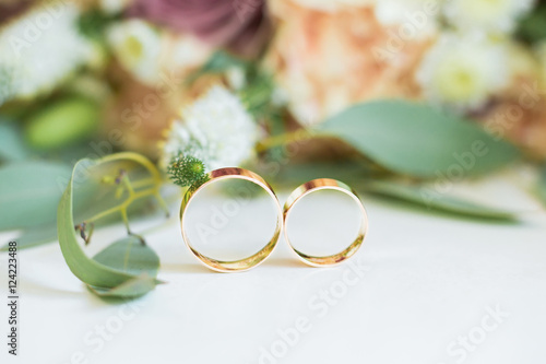 Two wedding rings and spring blossoms.