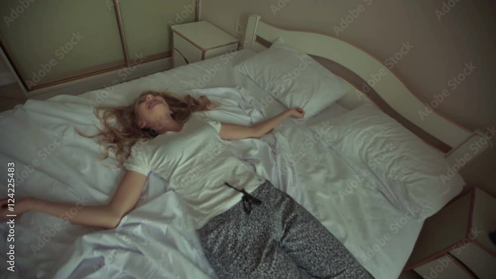 Lady resting in her bedroom. Lady resting in her bedroom.