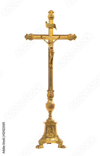 Antique gold cross on white background