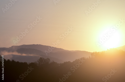 the sunrise over mountains