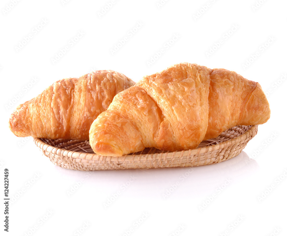 Fresh and tasty croissant isolated on white background. Closeup.