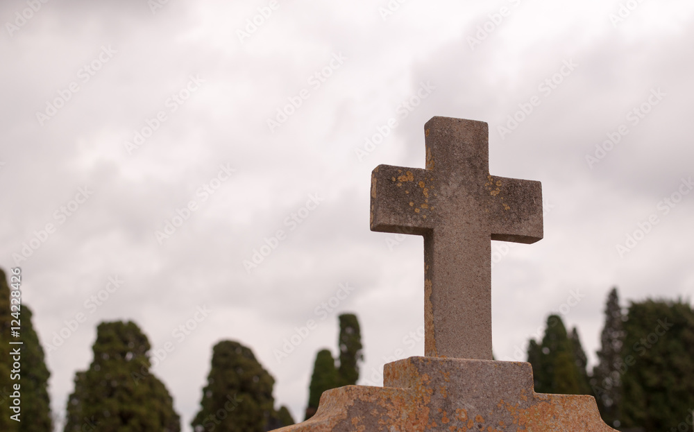 cross from a grave in the cemetery
