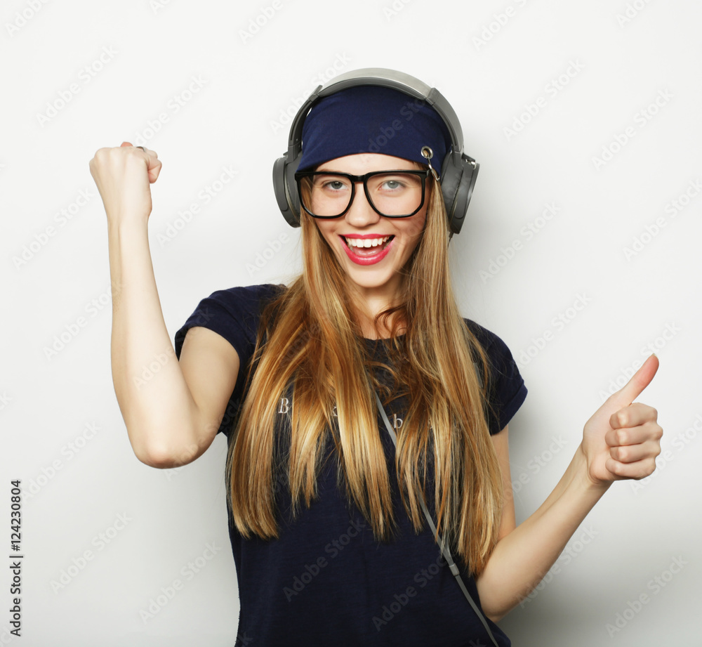 Happy young woman giving thumb up Happy young woman giving thumb up