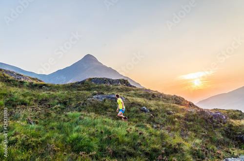 Trailrunner in the Scottish Highlands at Loch Leven, Great Brittain