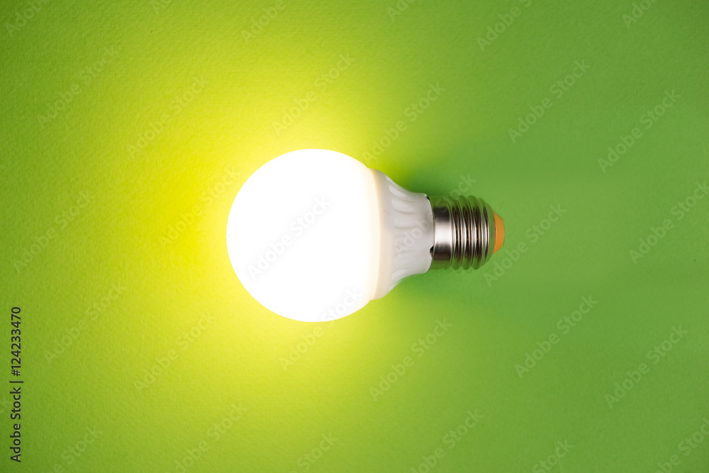 glass bulbs for lampson green background - idea concept glass bulbs for lampson green background - idea concept