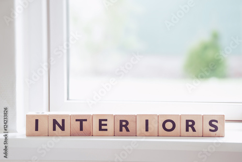 Wooden interior sign in a bright room