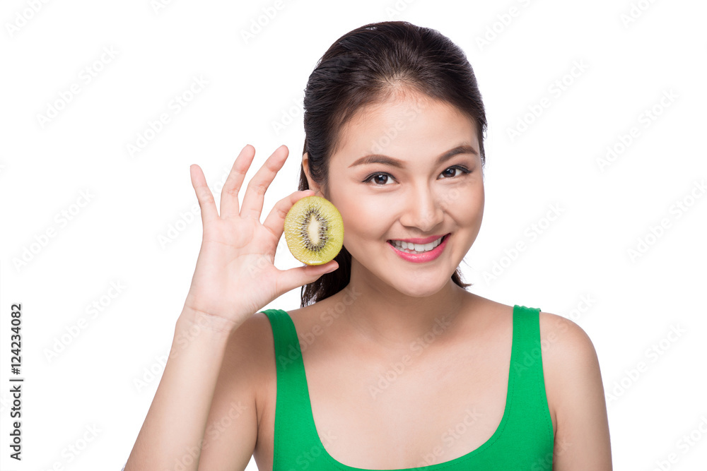 Kiwi fruit. Happy young asian woman holding kiwi fruit isolated Kiwi fruit. Happy young asian woman holding kiwi fruit isolated