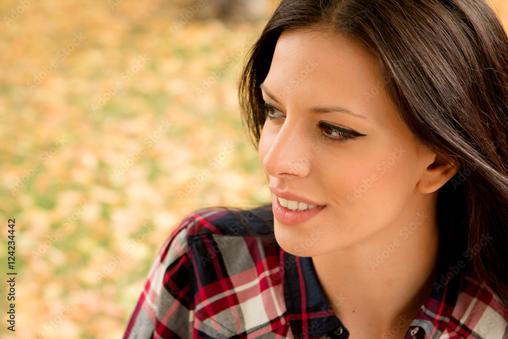 Beautiful brunette girl taking a walk in autumn Beautiful brunette girl taking a walk in autumn