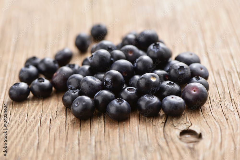 blueberries on a wooden table blueberries on a wooden table