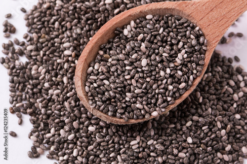 Chia seeds on wood background. Chia seeds protect heart,superfood. Healthy food
