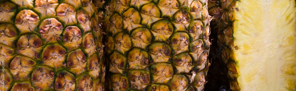 Fresh and juicy pineapples close up on a country farm market Fresh and juicy pineapples close up on a country farm market