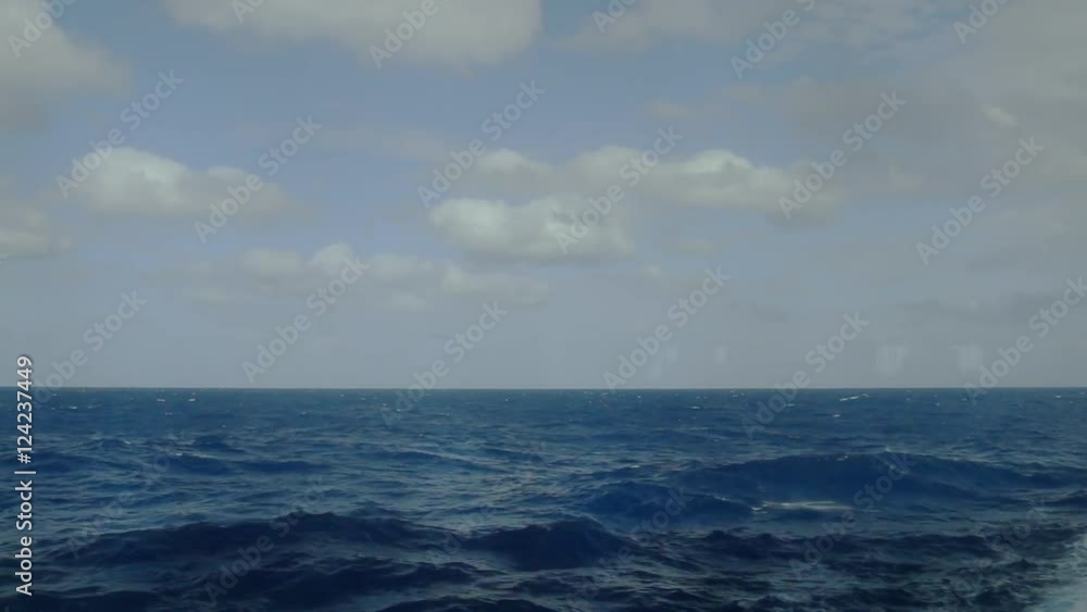 Open ocean steadicam pan, shot from a cruise ship. Open ocean steadicam pan, shot from a cruise ship.