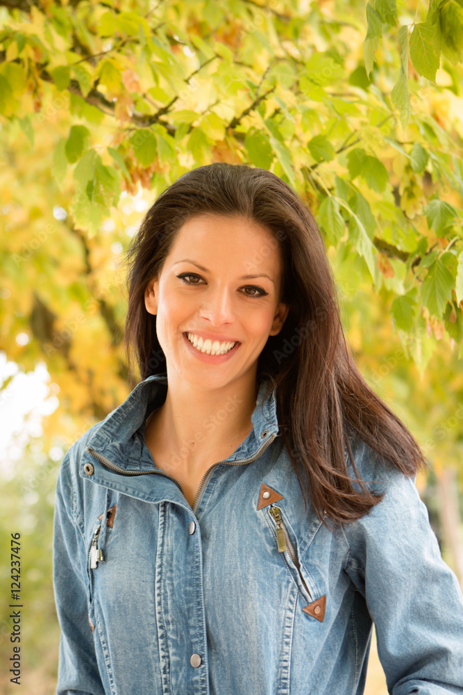 Beautiful brunette girl taking a walk in autumn Beautiful brunette girl taking a walk in autumn