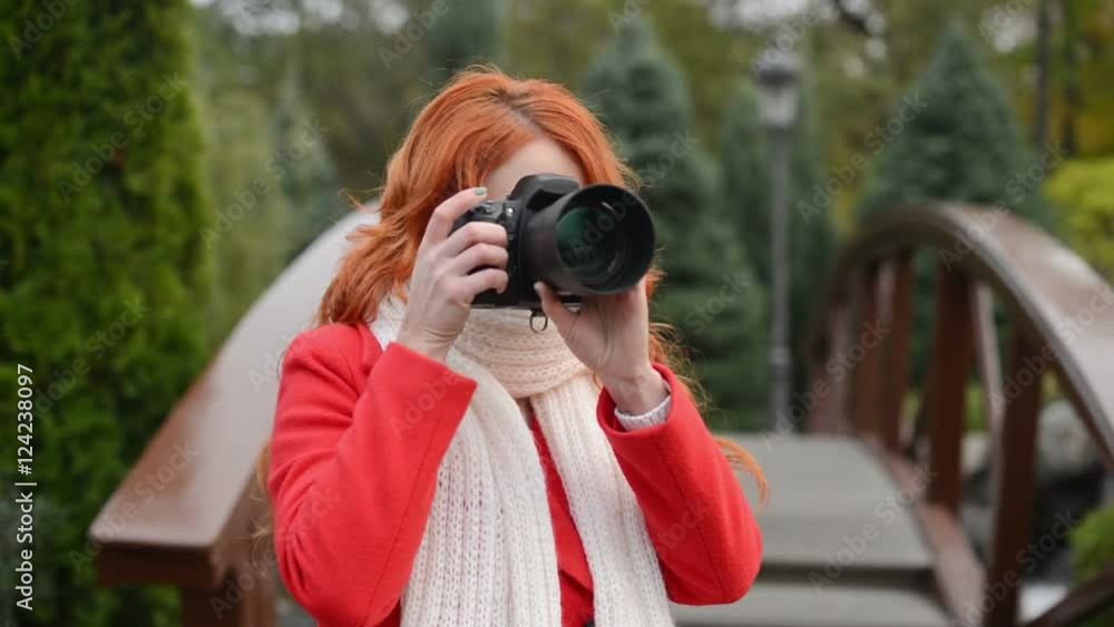 beautiful woman making photo using professional camera beautiful woman making photo using professional camera