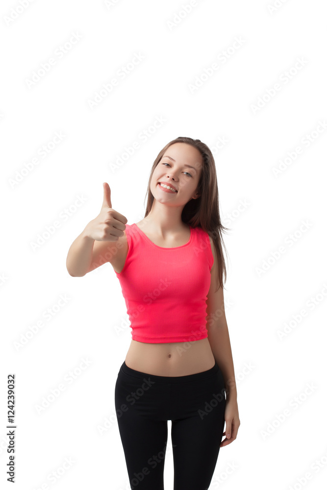 Beautiful young athletic girl shows thumbs up Beautiful young athletic girl shows thumbs up