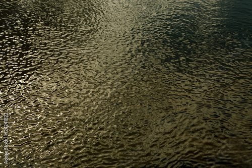 Water in river with small waves.