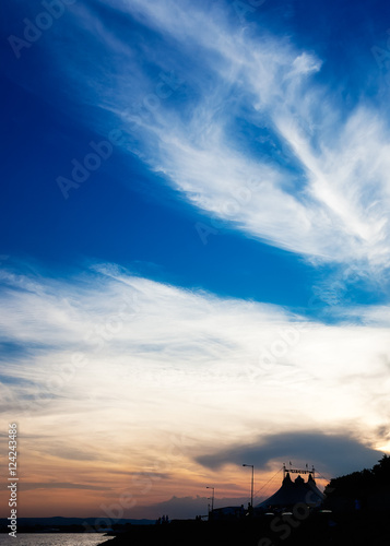 The circus on the waterfront at sunset sky background