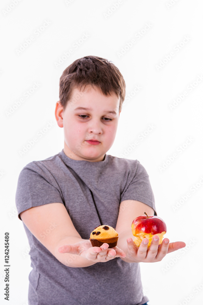 little boy with food isolated on white background - apple or a m little boy with food isolated on white background - apple or a m