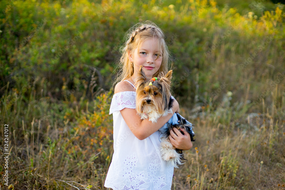 Obraz premium girl on walk with dog
