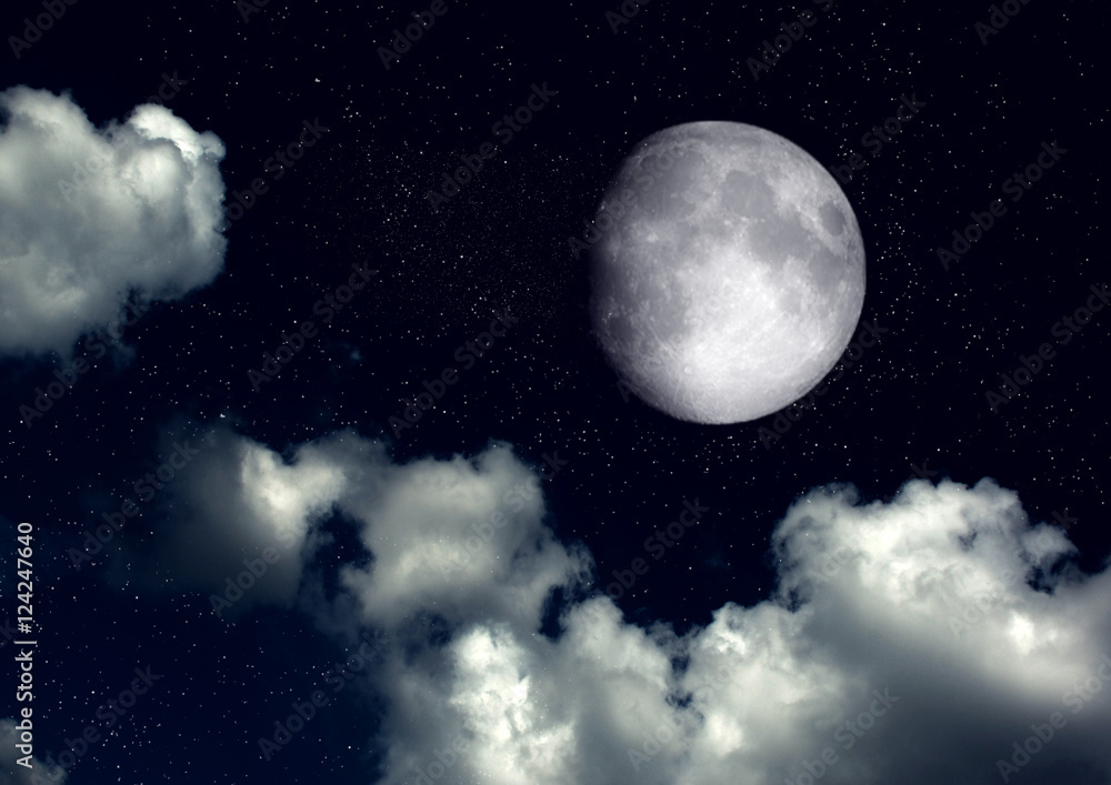 The moon in the night sky in clouds The moon in the night sky in clouds