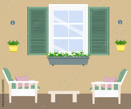 terrace with furniture, flowers and a window
