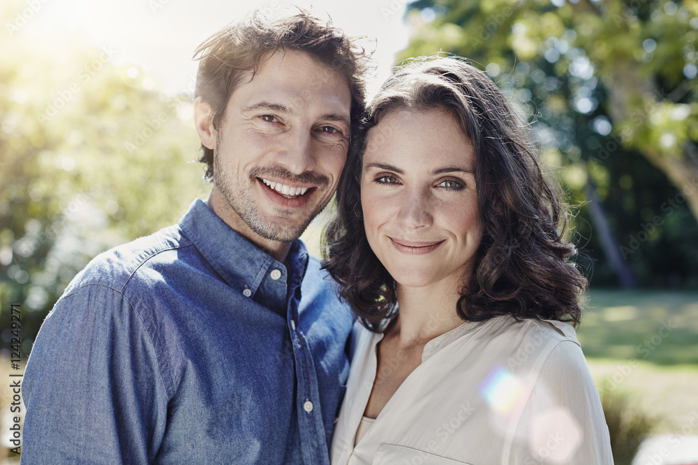 Portrait of smiling couple in park Portrait of smiling couple in park