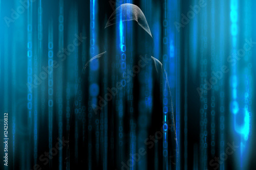 Hacker with a hood and blue binary code matrix. Hacking the confidential secret data.