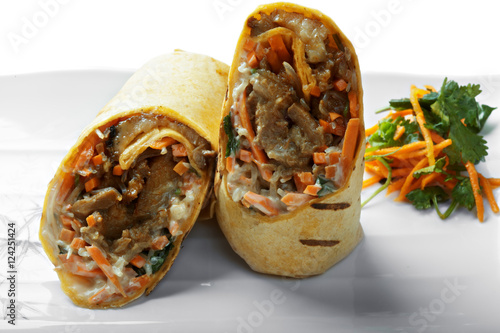 Burrito with grilled meat closeup