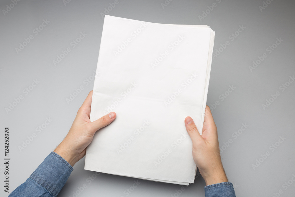 Blank Newspaper in hand Mock-up Blank Newspaper in hand Mock-up