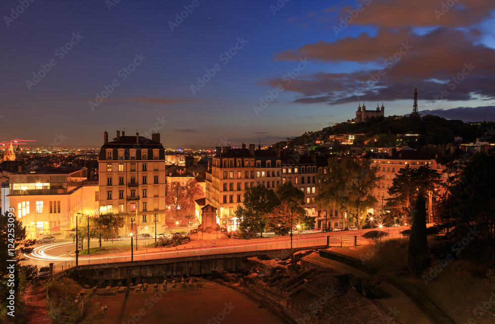 Amphitheatre des Troi Gaules and Basilica Notre-Dame de Fourviere in the evening. Lyon, France